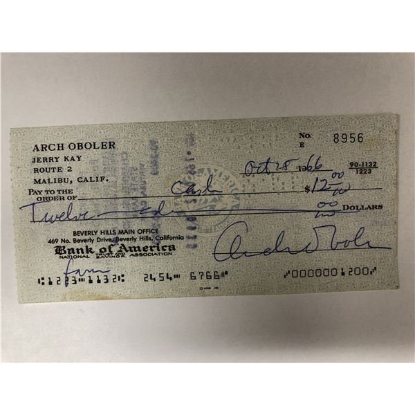 House on Fire first edition and personal check