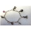 Image 1 : 20) SILVER TONE CHARM BRACELET WITH CRYSTALS