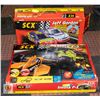 Image 1 : 2 BOXES SCX SLOT CARS & TRACK, POWER ADAPTER &
