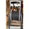 Image 1 : COSTCO 100' RUBBER HOSE AND WHEEL