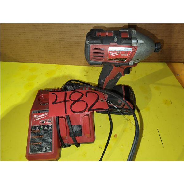 Milwaukee Impact Drill with charger (tested)