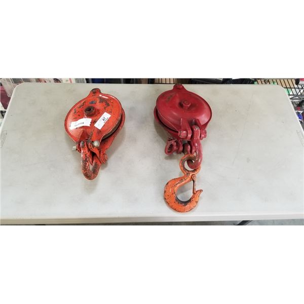 TWO LARGE PULLEY'S