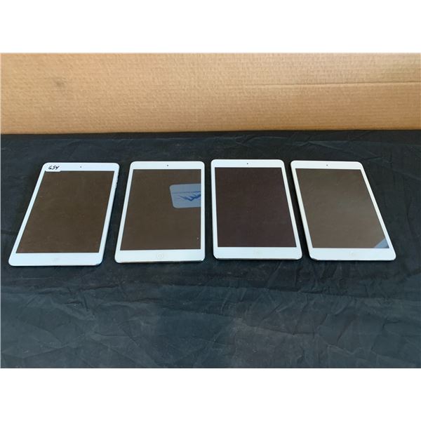Lot of 4 Apple iPad Mini's For Parts Or Repair