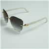 Image 2 : Cartier Rimless Sunglasses with Gold and Pearlized Temples