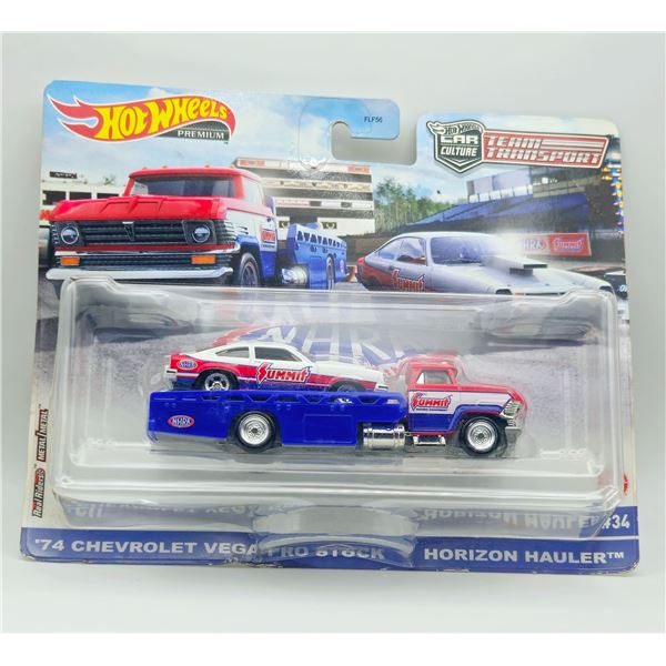 HOT WHEELS PREMIUM TEAM TRANSPORT 74 CHEVY VEGAS