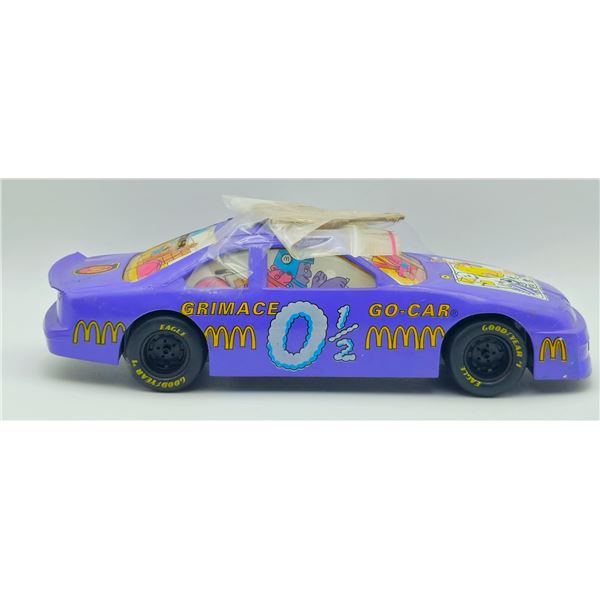 MCDONALDS RACING CHAMPIONS GRIMACE GO-CAR BANK