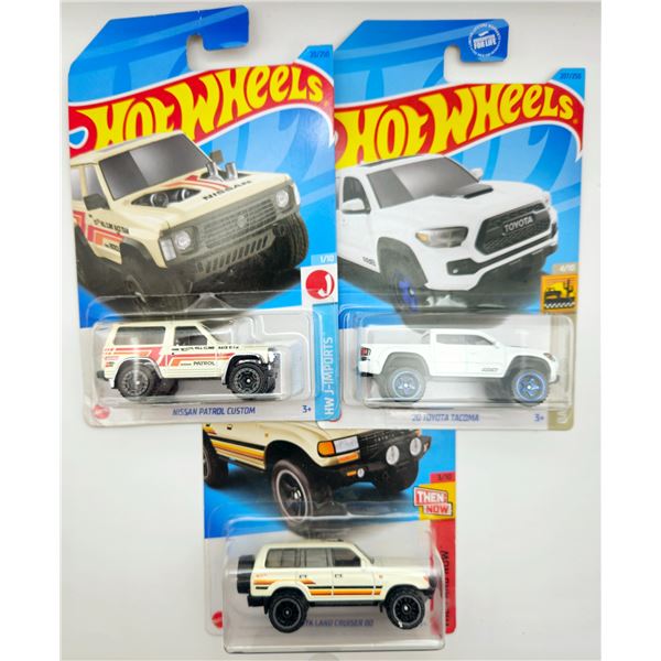 3 HOT WHEELS NISSAN PATROL & 20 TOYOTA TACOMA &