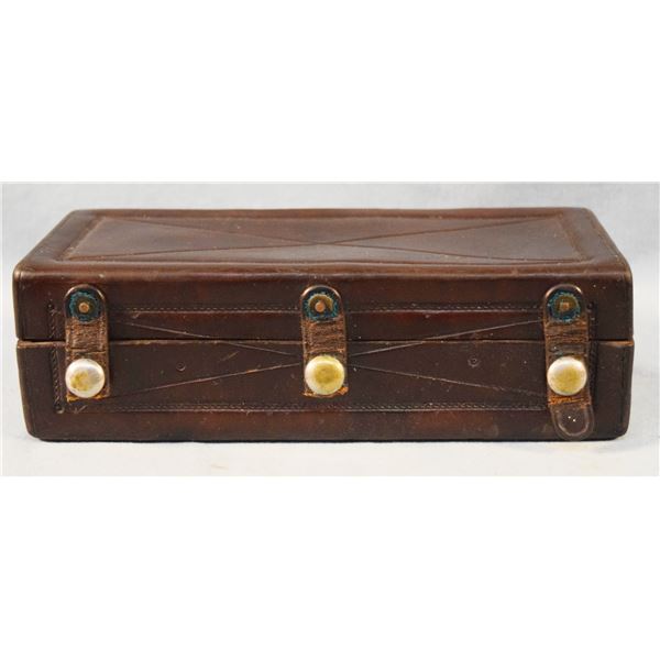 F. A. Meanea leather shaving box, 3" x 9" x 4", Cheyenne, WY.