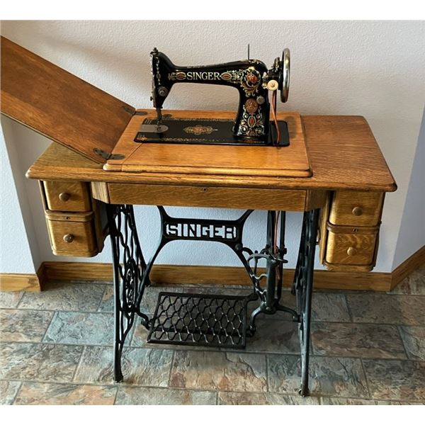 Singer treadle sewing machine in oak cabinet, excellent condition