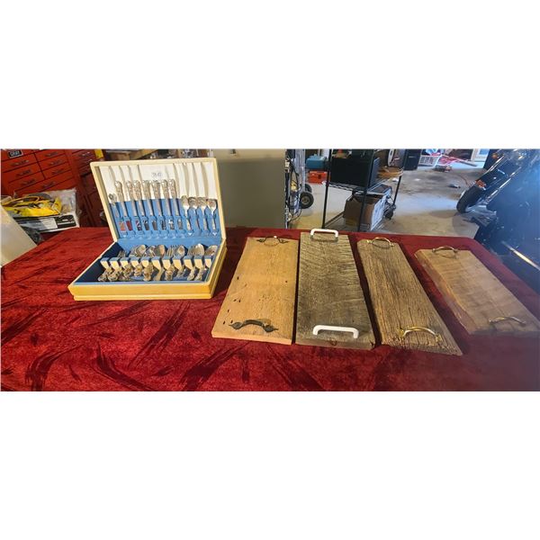 SILVER PLATED CUTTLERY SET BY 1847 ROGERS BROS. AND FOUR SERVING BOARDS