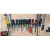 Image 16 : TWO TRACKS OF NUT DRIVERS, SCREW DRIVERS WITH MISC WALL ITEMS