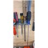Image 21 : TWO TRACKS OF NUT DRIVERS, SCREW DRIVERS WITH MISC WALL ITEMS