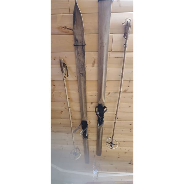 SET OF SKI'S AND POLES ON ROOF