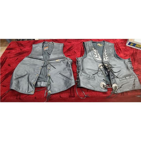 TWO LEATHER RIDING VESTS ONE MED AND ONE XL
