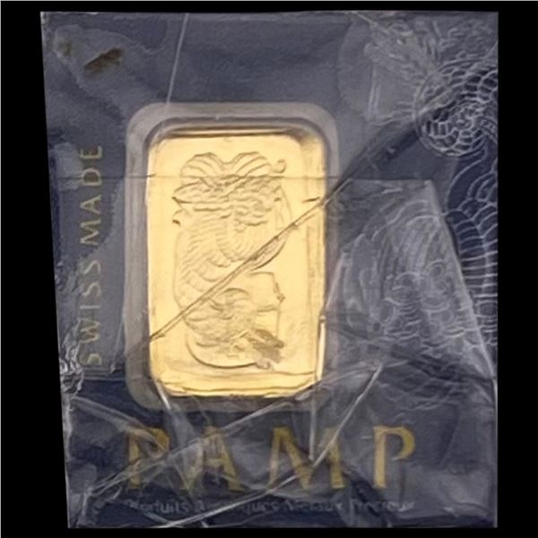 These images show a PAMP Suisse 1g Gold UNCIRCULATED