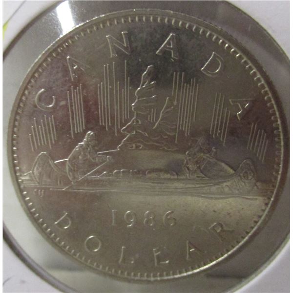 1986 AU CANADA VOYAGER DOLLAR (LEGAL TENDER)