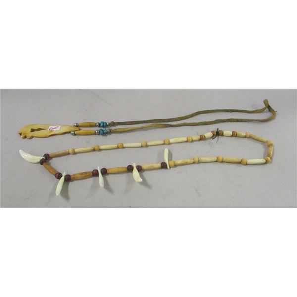 SEIZURE:  2 NECKLACES (1 WITH TOOTH & 1 WITH WOLF)