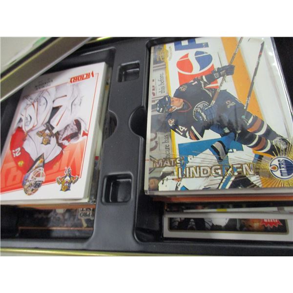 COLLECTABLE:  OVER 100 HOCKEY TRADING CARDS IN TIN