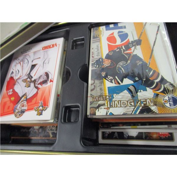 COLLECTABLE:  OVER 100 HOCKEY TRADING CARDS IN TIN