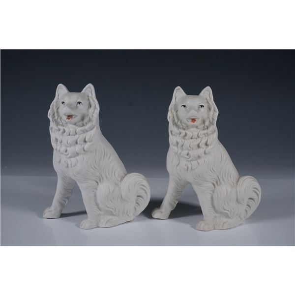 Pair of Decorative Bisque Porcelain Dog Figurines