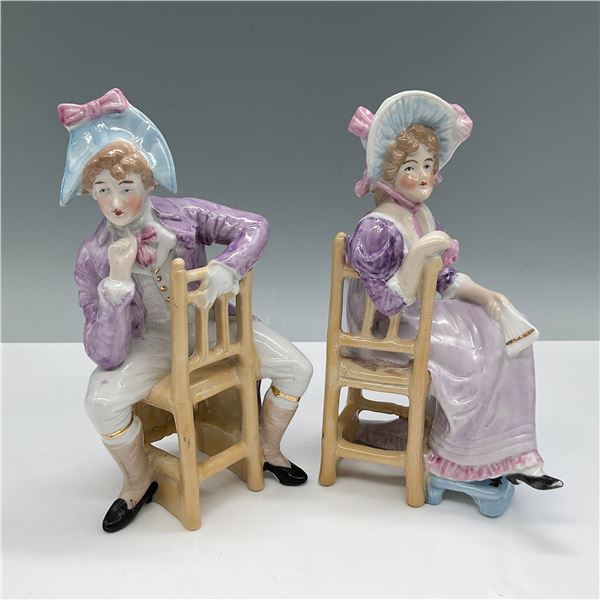 2pc Unger Schneider Figurines, Man and Woman on Chairs