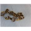 Image 2 : Godzilla Gold Colored Bracelet, Other Jewelry Needs Repair