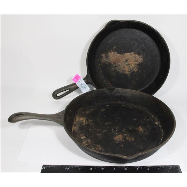 TWO CAST IRON FRYING PANS, APPROX 10" AND 11"