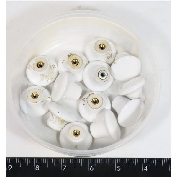 CONTAINER OF WHITE KNOBS FOR CUPBOARDS