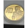 Image 1 : Commemorative Gold-Colored Coin Featuring Muhammad Ali, Heavyweight Champion