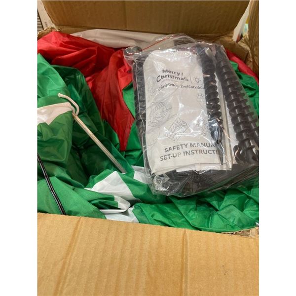 Inflatable Christmas Decoration with Accessories and Safety Manual