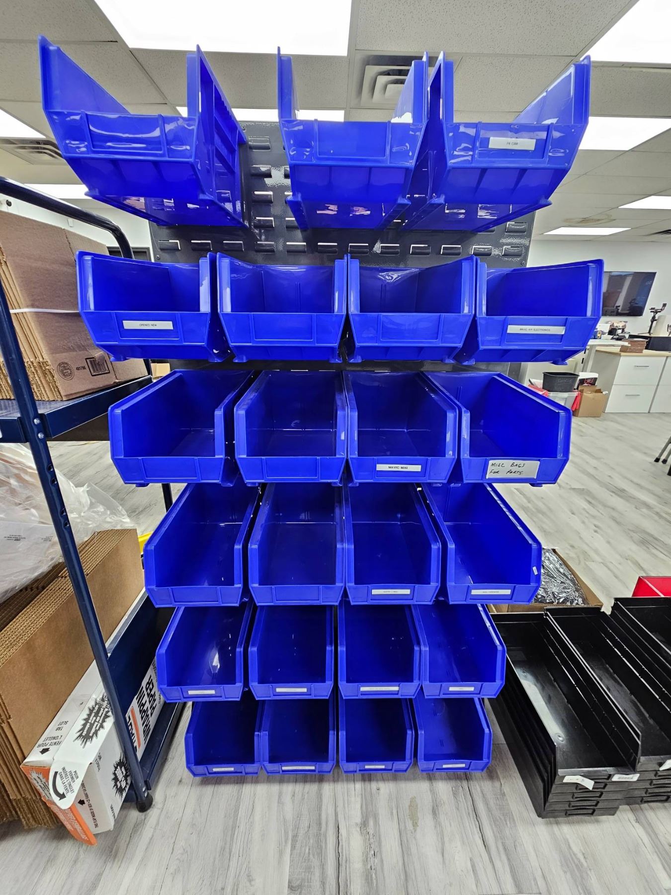 Blue Modular Storage Bin Rack with Metal Slotted Back Panel 66×33″