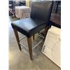Image 2 : BLACK LEATHER CHAIR WITH WOODEN BASE AND NEW IKEA LIGHT