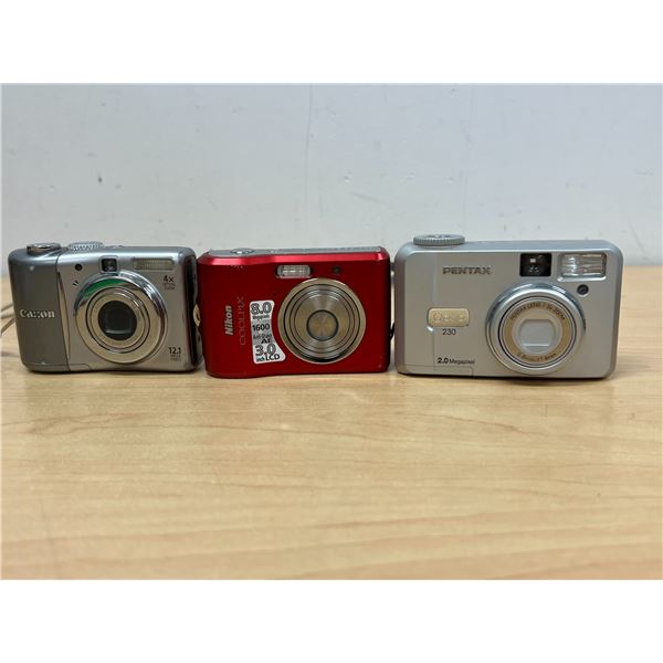 3 Digital Cameras - All use AA batteries. NO SD cards - not tested