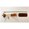 Image 2 : REVOLVER DISPLAY STAND, LEATHER REVOLVER SIGN, PISTOL STAND AND CLEANING ROD LOT