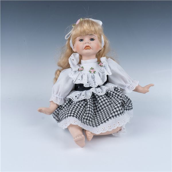 Crying Porcelain Sitting Doll