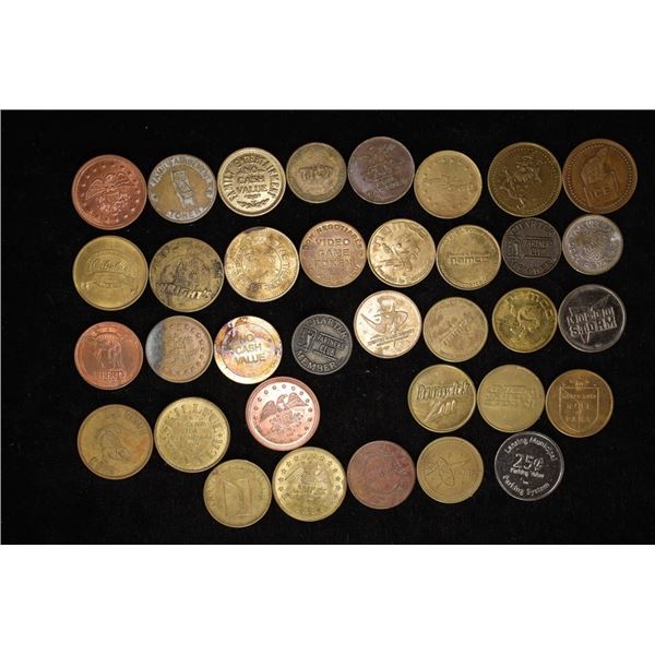36 ASSORTED AMUESMENT / ARCADE TOKENS: LASER