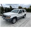 Image 1 : JEEP GD CHEROKEE 2000 SALV T/DONATION