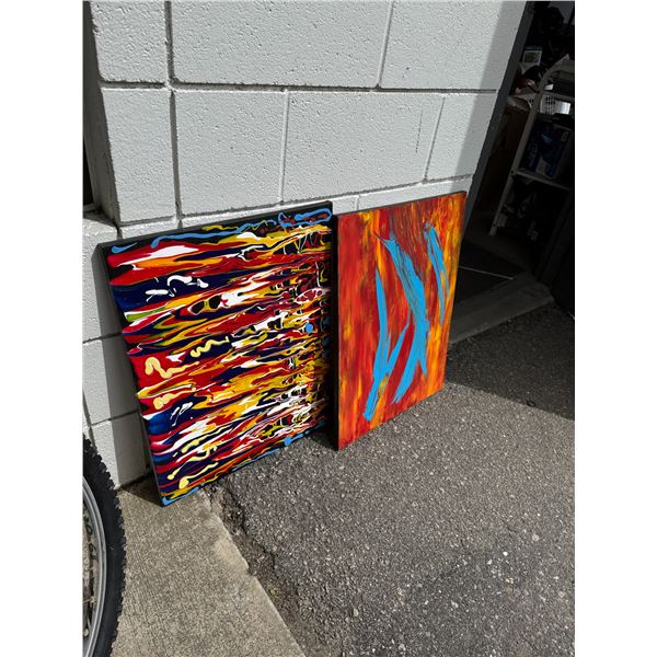 Two abstract wall hangings