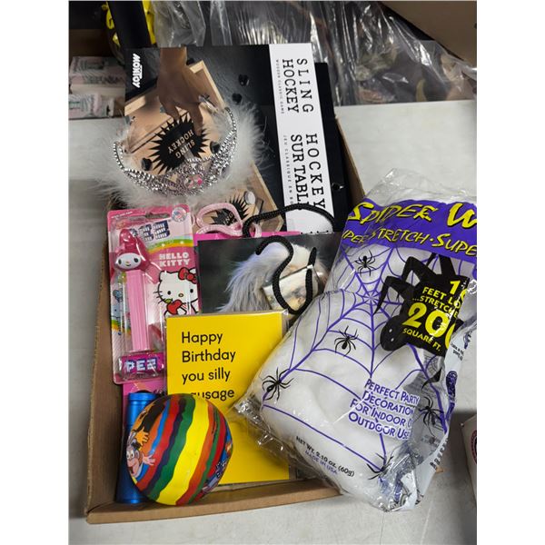 Sling hockey, hello Kitty, Pezz dispenser and other items