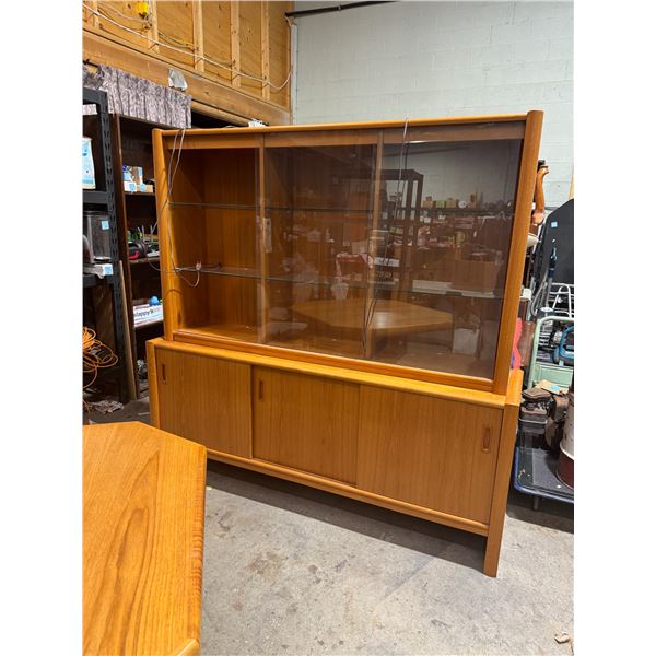 China cabinet two piece measure 71 inches long 18 1/2 inches deep and 69 and three-quarter
