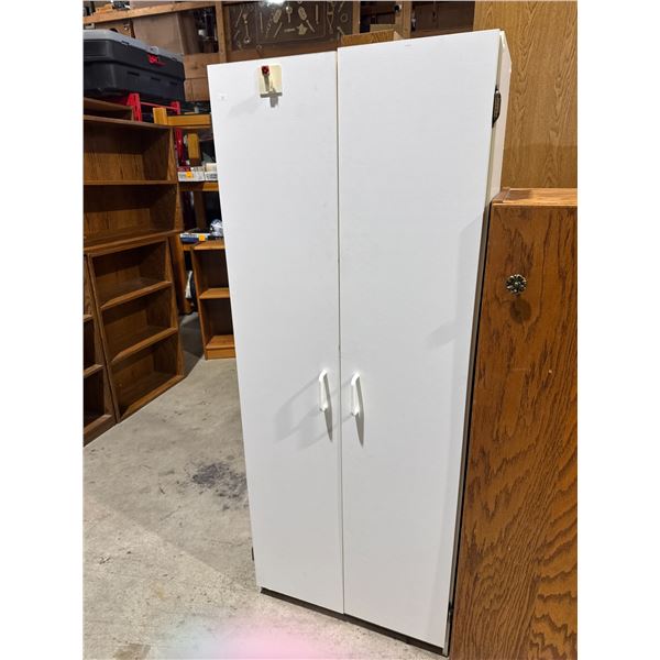 Cupboard measures 23 and three-quarter inches by 12 1/2" x 59"