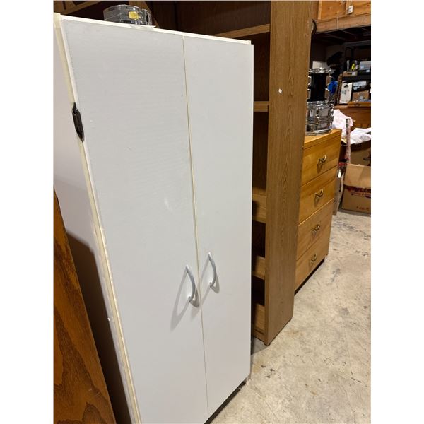 Cupboard measures 23 and three-quarter inches by 12 1/2" x 59"