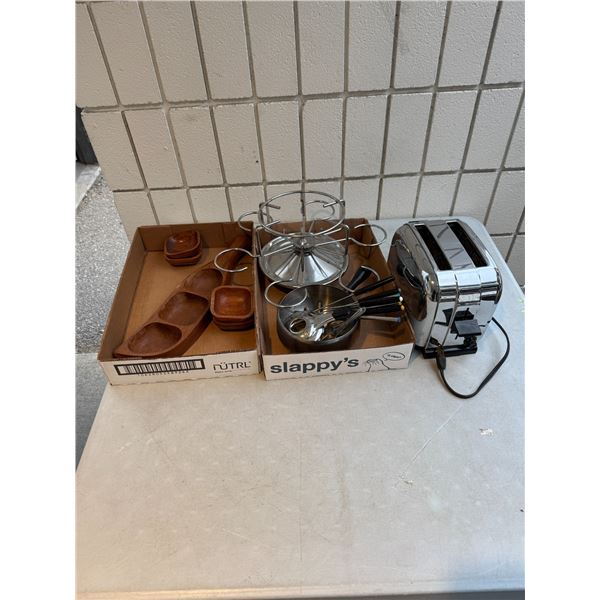 toaster, fondue items and wood, serving dishes