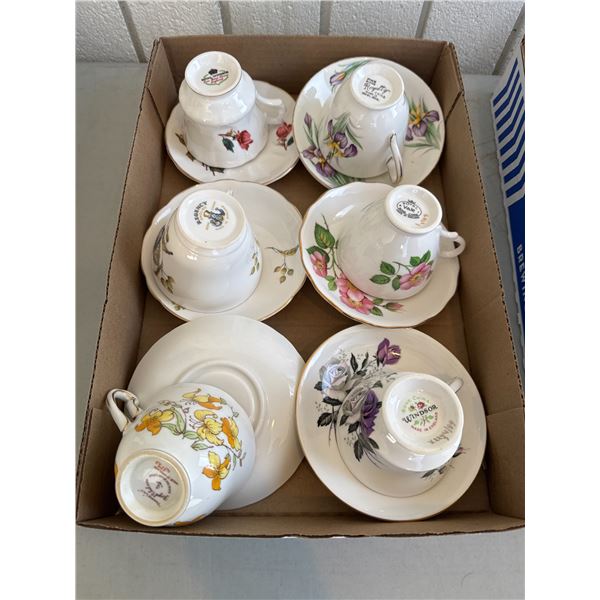 Assorted tea, cups, and saucers