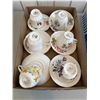 Image 1 : Assorted tea, cups, and saucers