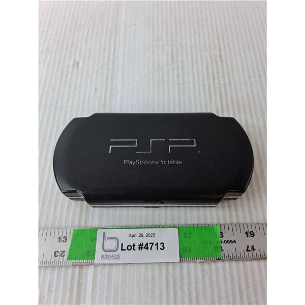 PSP Case with (8) Games- Rockband, Rush, World Series Poker, Misc.