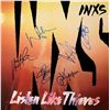 Image 1 : INXS Listen Like Thieves signed album