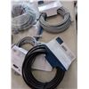Image 2 : RETRACTABLE UNIVERSAL 65W LAPTOP CHARGER WITH 13 ADAPTER TIPS AND CAT 6 ETHERNET CABLES
