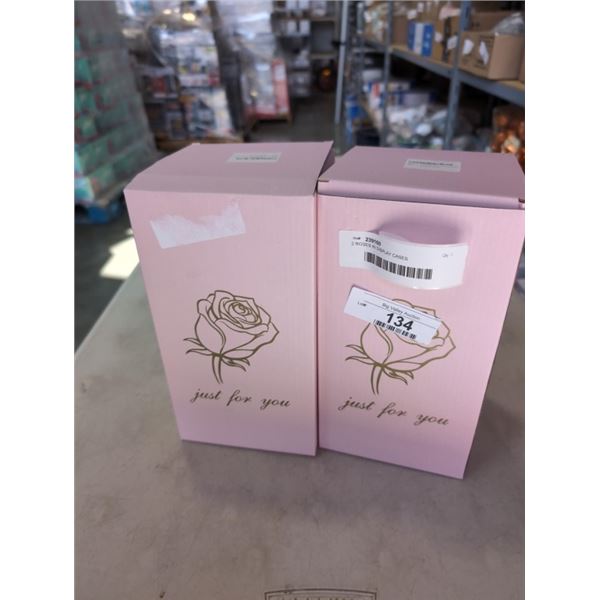 2 ROSES IN DISPLAY CASES