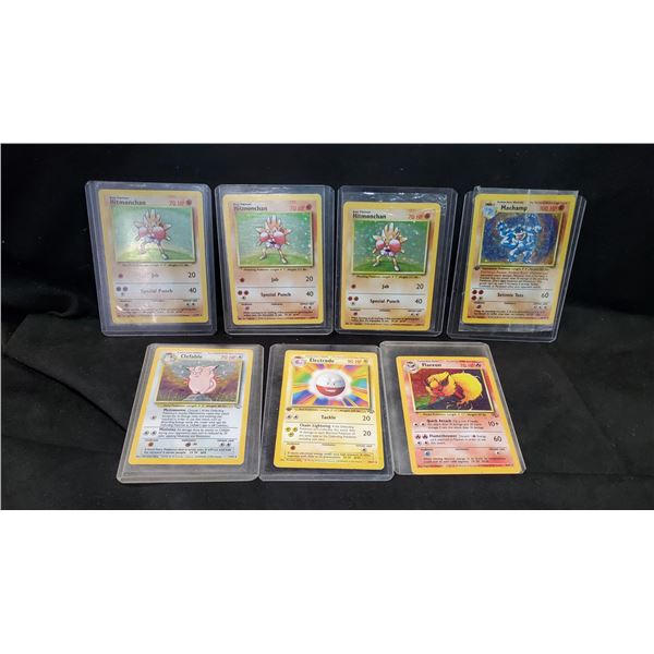 7 ASSORTED FIRST EDITION POKEMON CARDS INCLUDING; HOLO MACHAMP, HOLO FLAREON, HOLO HITMONCHAN, HOLE
